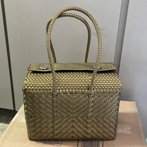 Basket weave style tote made of plastic materials